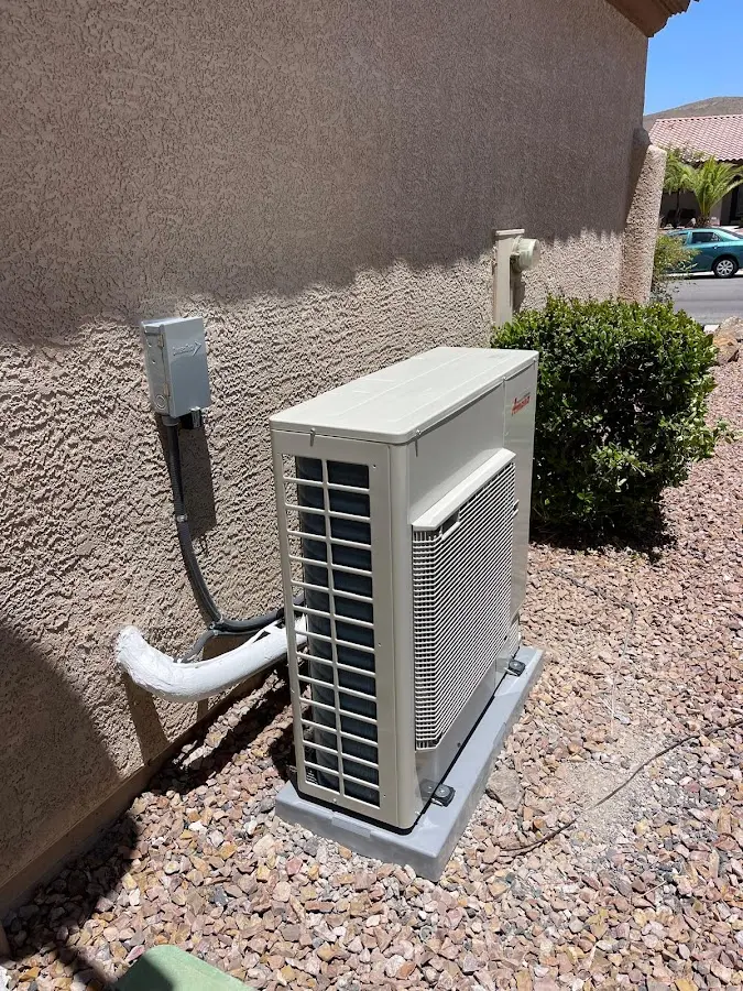 Residential air conditioning condenser unit in St. Francis